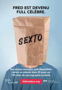 A man with a brown paper bag over her head with the word "Sexto" written on it.